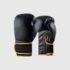 Black boxing gloves with gold trim on wrist strap